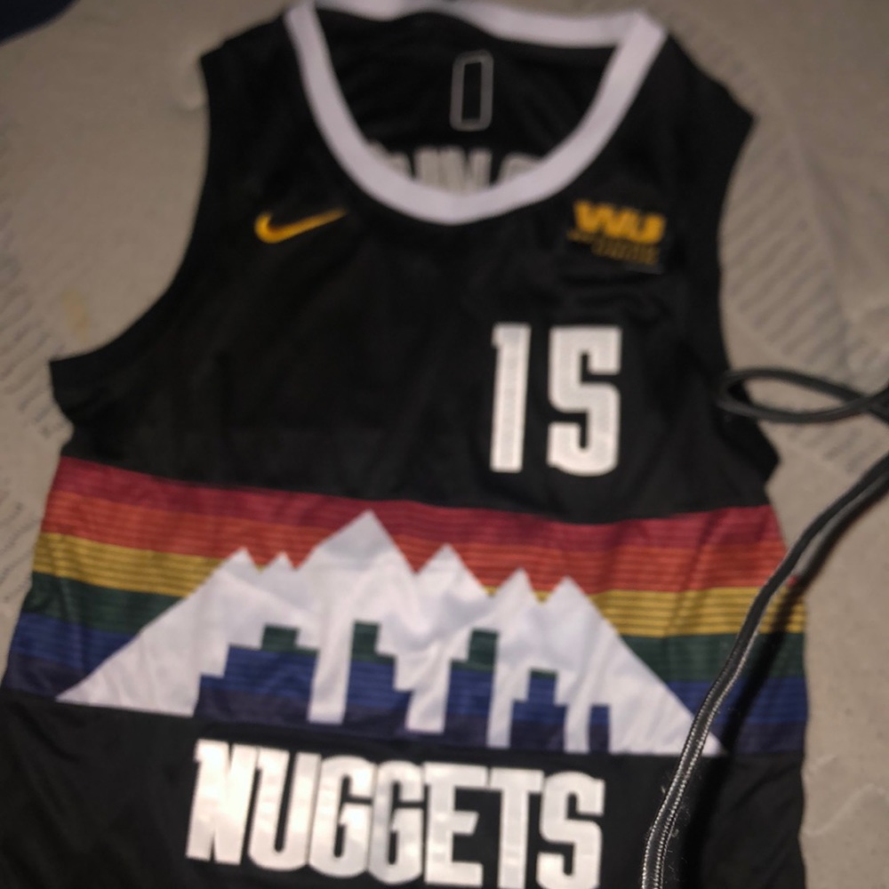 Jokic MVP City Edition Nike with cityscape design on the front. Size L.